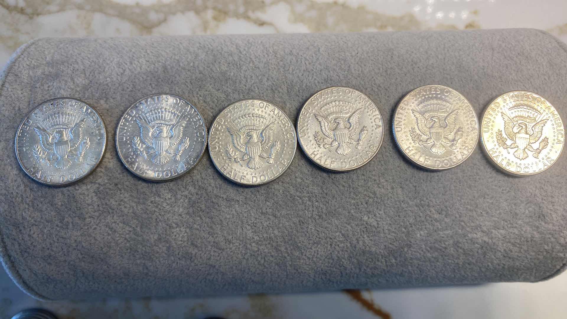 Photo 1 of 6-90% SILVER 1964 KENNEDY HALVES DOLLARS IN PLASTIC TUBE