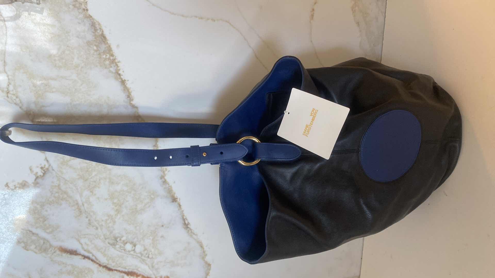 Photo 1 of NWT DIANE VON FÜRSTENBERG STEAMER LEATHER  HANDBAG BLACK/MARINE BLUE 9” x 15” EXCLUDING STRAP