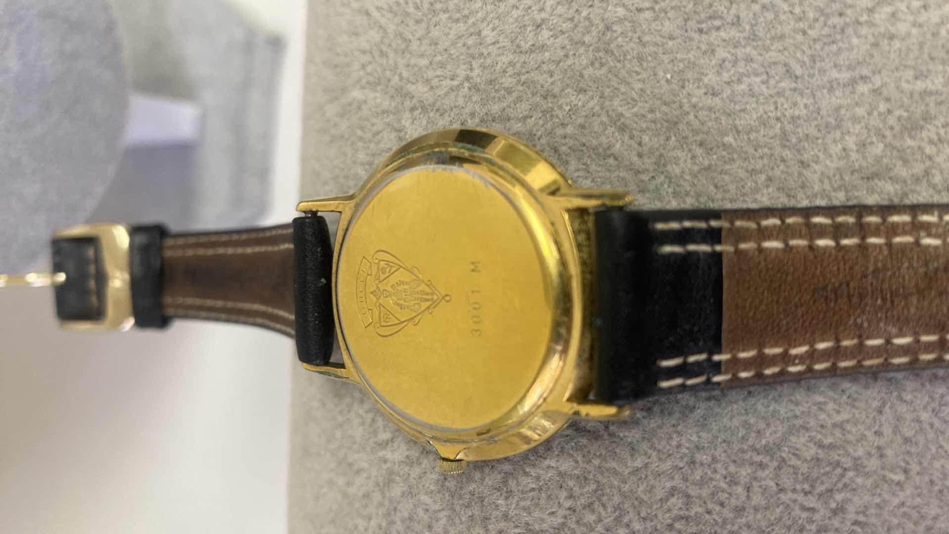 Photo 1 of FINE JEWELRY MENS GUCCI GOLD ROUND QUARTZ WATCH WITH LEATHER BAND