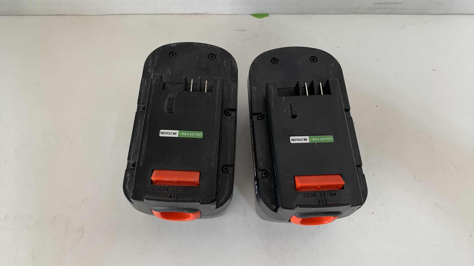 Photo 1 of 2-BLACK AND DECKER 24V BATTERIES