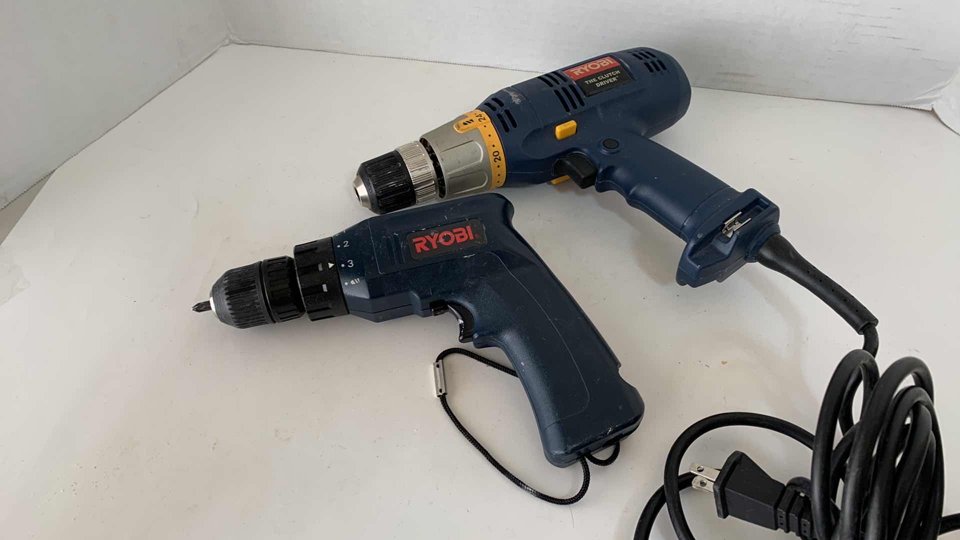 Photo 1 of 2-RYOBI DRILLS THE CLUTCH DRIVER