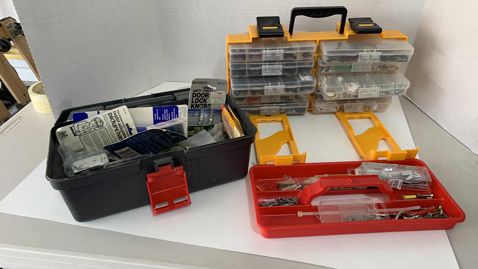 Photo 1 of 2-CONTAINERS OF ASSORTED HARDWARE AND SPRINKLER REPAIR ITEMS