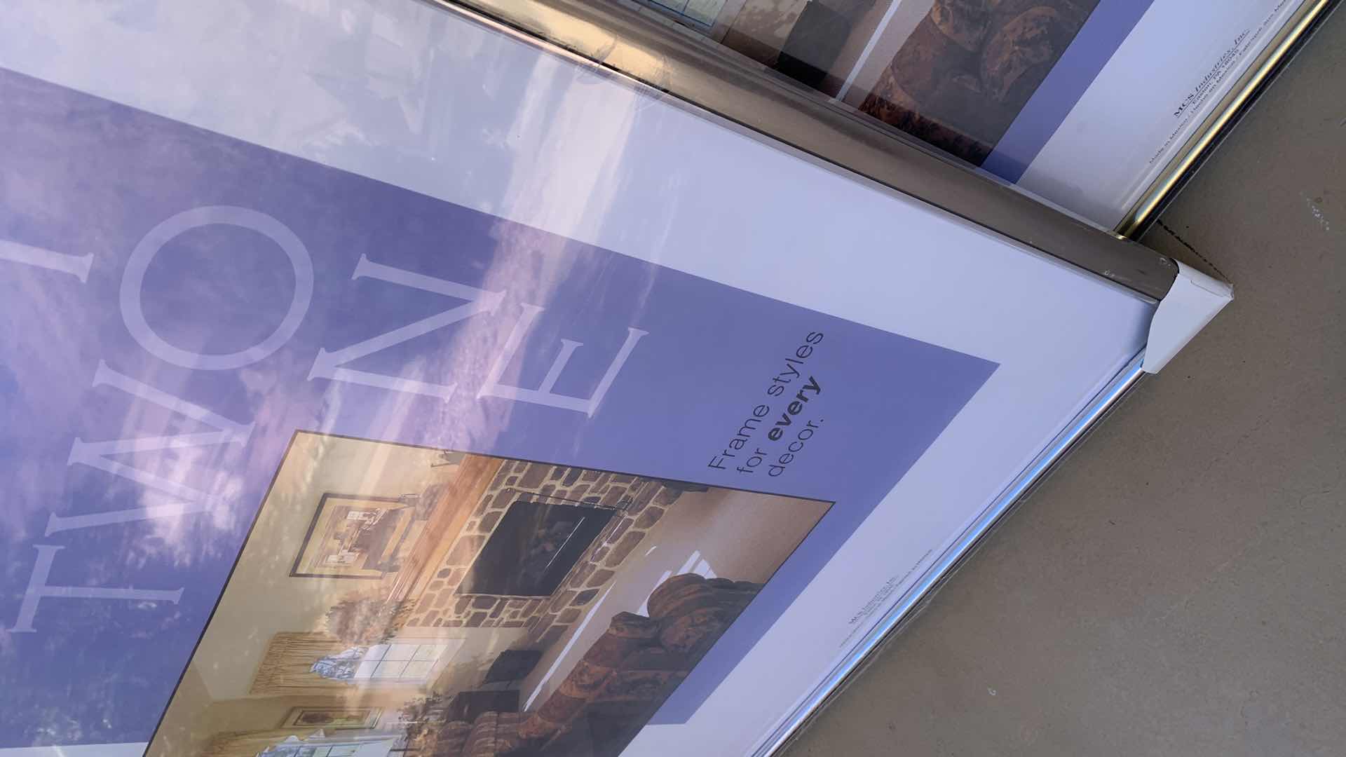 Photo 1 of 2-24” X 36” METAL PICTURE FRAMES