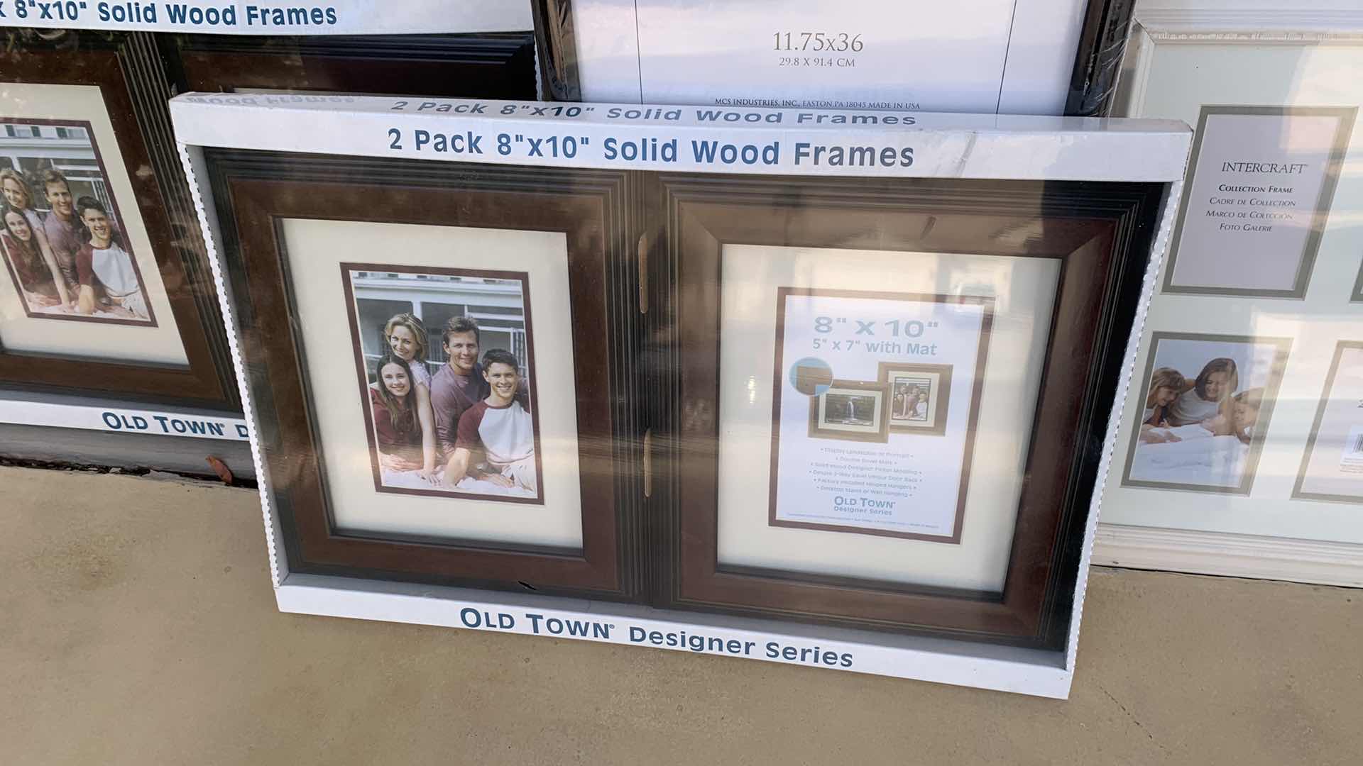 Photo 1 of 4-PICTURE FRAMES AND A CORK BOARD