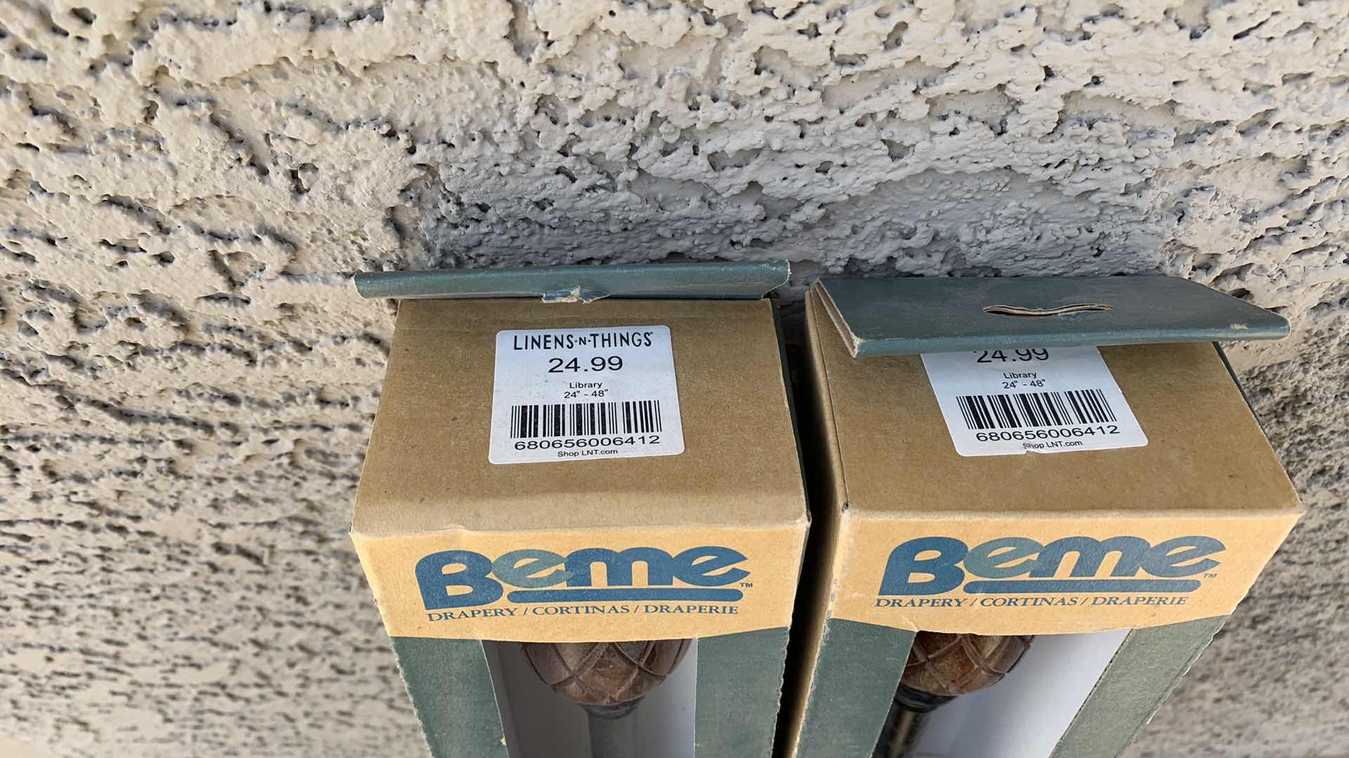 Photo 1 of 2-CURTAIN RODS AND DECORATIVE BRACKETS