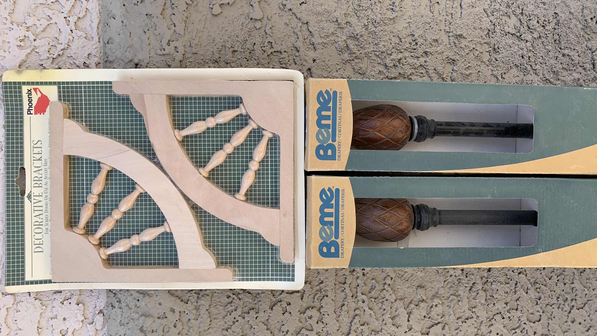 Photo 1 of 2-CURTAIN RODS AND DECORATIVE BRACKETS