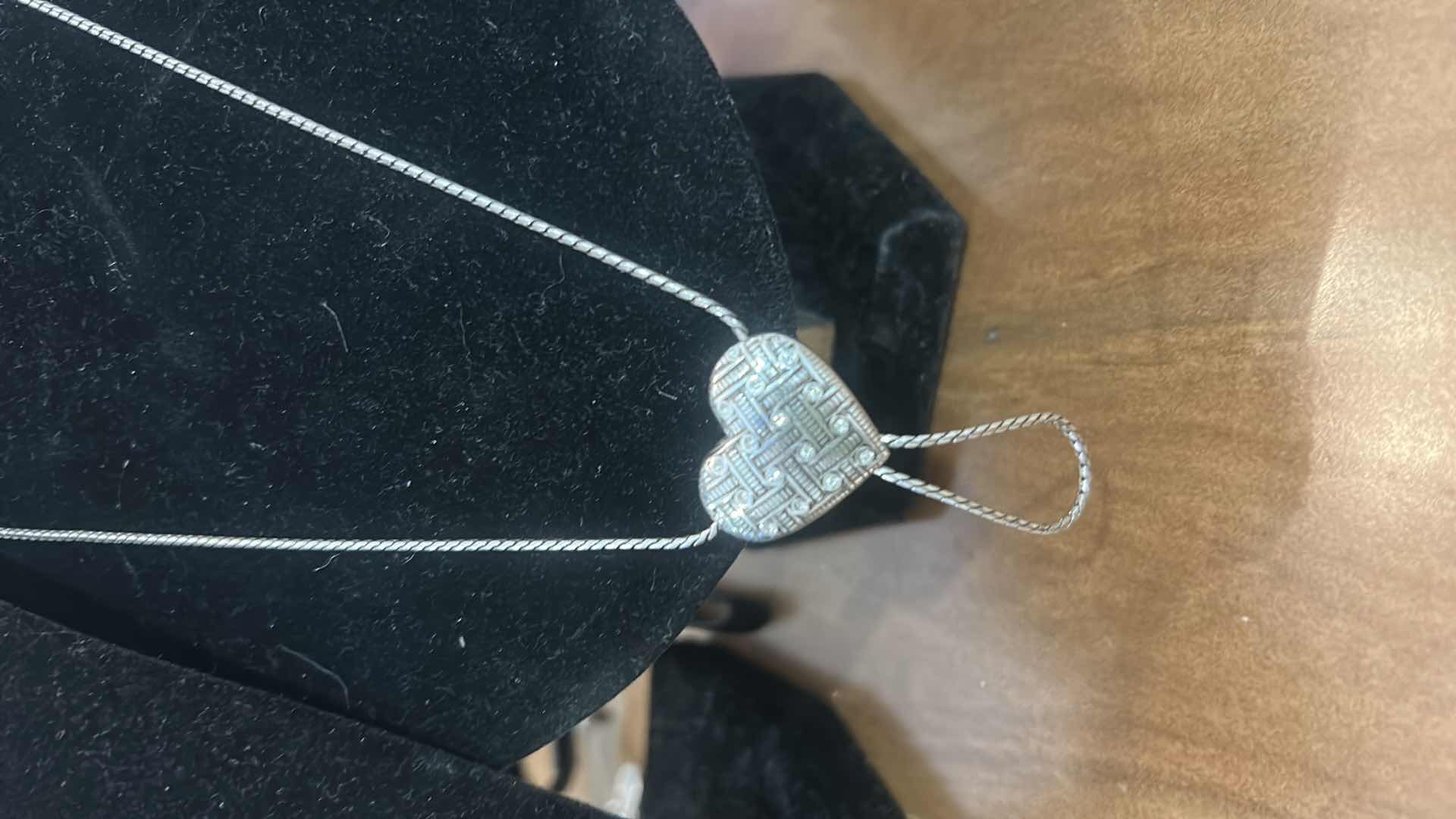 Photo 1 of 2 HEART NECKLACES: BRIGHTON SILVER-PLATED CRYSTAL LARIAT HEART NECKLACE, FEATURING A REVERSIBLE PENDANT AND A UNIQUE LOOP DESIGNED FOR CHARMS..925 STERLING CHAIN WITH CZ HEART