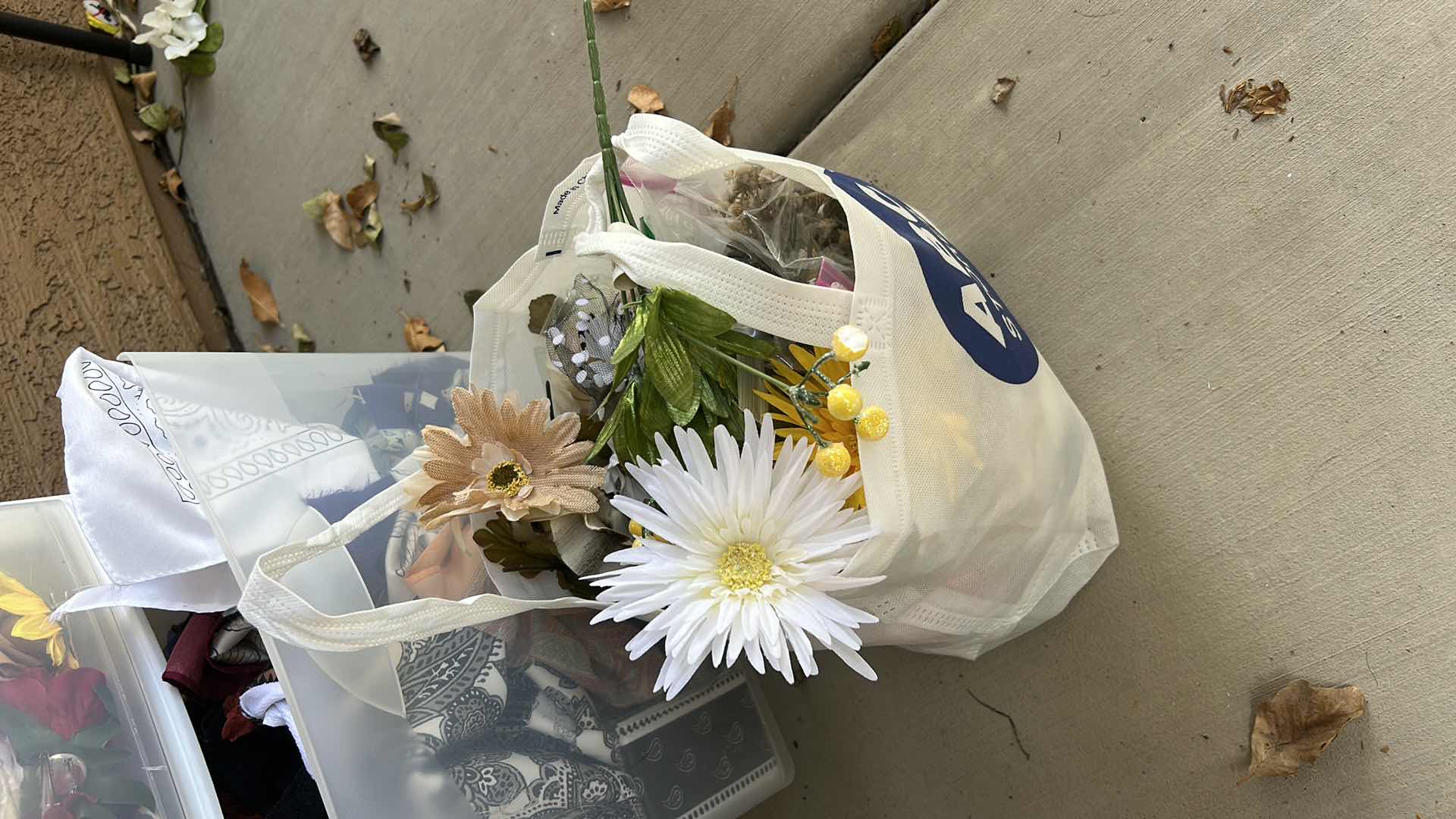 Photo 1 of ROLLED STORAGE WITH CRAFTING SUPPLIES, FAUX FLOWERS AND FABRIC