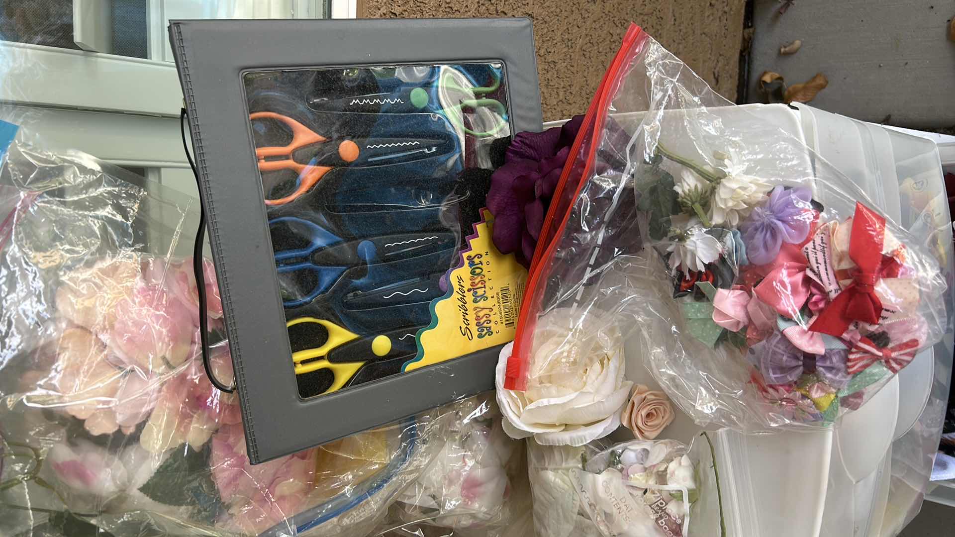 Photo 1 of ROLLED STORAGE WITH CRAFTING SUPPLIES, FAUX FLOWERS AND FABRIC