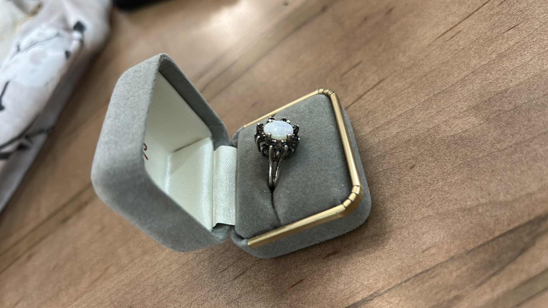 Photo 1 of STAMPED .925 STERLING SILVER RING WITH OPAL AND RED GEMSTONES EST SIZE 6