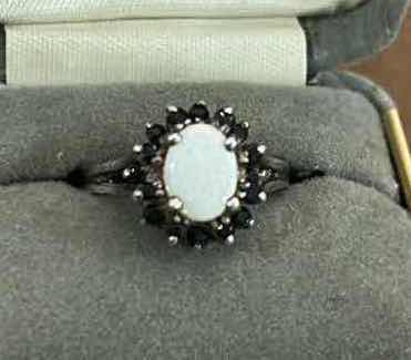 Photo 1 of STAMPED .925 STERLING SILVER RING WITH OPAL AND RED GEMSTONES EST SIZE 6