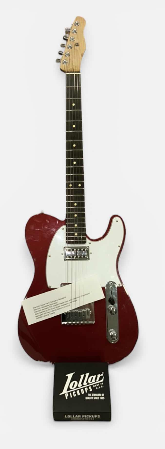 Photo 1 of WARMOTH GUITAR PARTS COMPANY TELECASTER
WARMOTH TELECASTER STYLE BODY
WARMOTH STANDARD THIN ROASTED MAPLE NECK WITH ROSEWOOD FINGERBOARD
BODY PAINTED BY SIX GUNN MUSIC LOCATED IN LAS VEGAS EQUIPPED WITH TWO LOLLAR (LOLLARTRON PICKUPS)