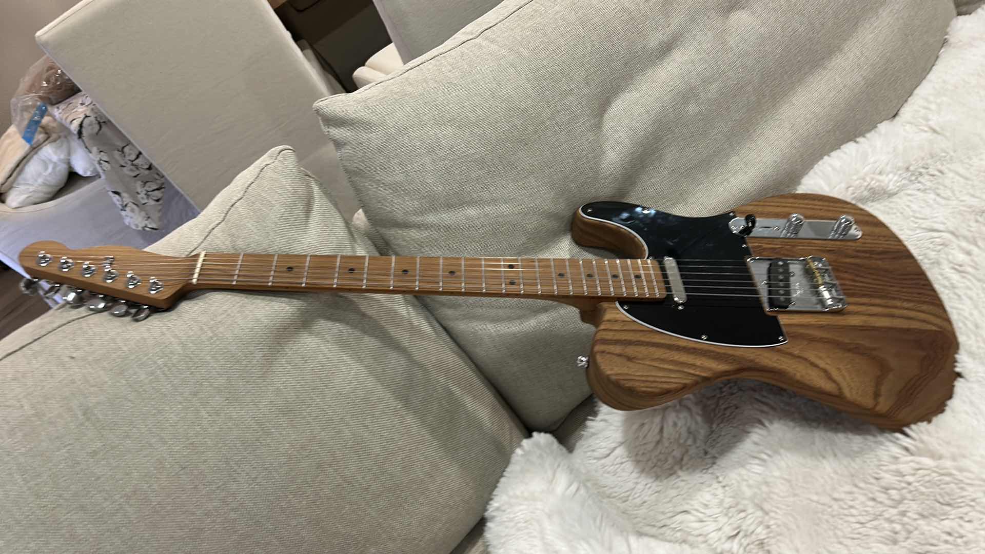 Photo 1 of WARMOTH GUITAR PARTS COMPANY TELECASTER
WARMOTH TELECASTER STYLE BODY
WARMOTH STANDARD THIN ROASTED MAPLE NECK
FENDER LOCKING TUNERS
EQUIPPED WITH ARCANE 50 EXPERIENCE TELE SET PICKUPS
HAND RUBBED WITH TWO COATS OF TUNG OIL FINISH 
GLENDALE BRIDGE AND SAD