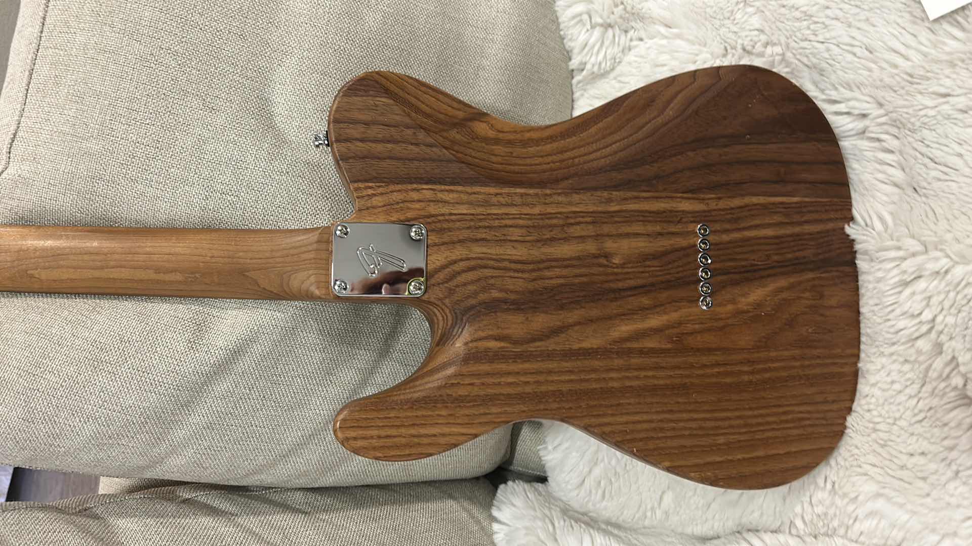 Photo 1 of WARMOTH GUITAR PARTS COMPANY TELECASTER
WARMOTH TELECASTER STYLE BODY
WARMOTH STANDARD THIN ROASTED MAPLE NECK
FENDER LOCKING TUNERS
EQUIPPED WITH ARCANE 50 EXPERIENCE TELE SET PICKUPS
HAND RUBBED WITH TWO COATS OF TUNG OIL FINISH 
GLENDALE BRIDGE AND SAD
