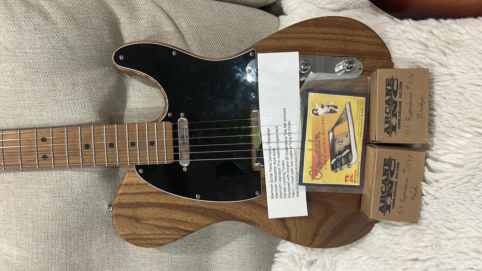 Photo 1 of WARMOTH GUITAR PARTS COMPANY TELECASTER
WARMOTH TELECASTER STYLE BODY
WARMOTH STANDARD THIN ROASTED MAPLE NECK
FENDER LOCKING TUNERS
EQUIPPED WITH ARCANE 50 EXPERIENCE TELE SET PICKUPS
HAND RUBBED WITH TWO COATS OF TUNG OIL FINISH 
GLENDALE BRIDGE AND SAD