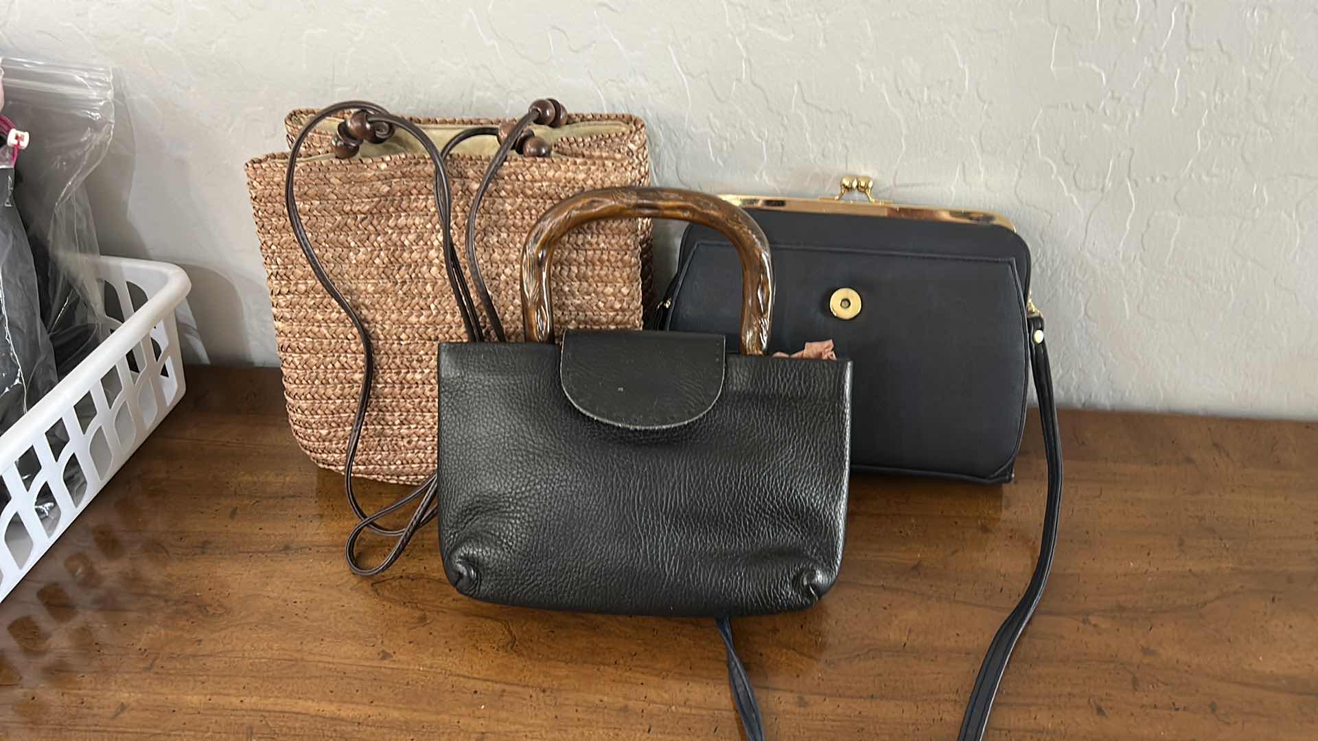 Photo 1 of THREE LADIES HANDBAGS