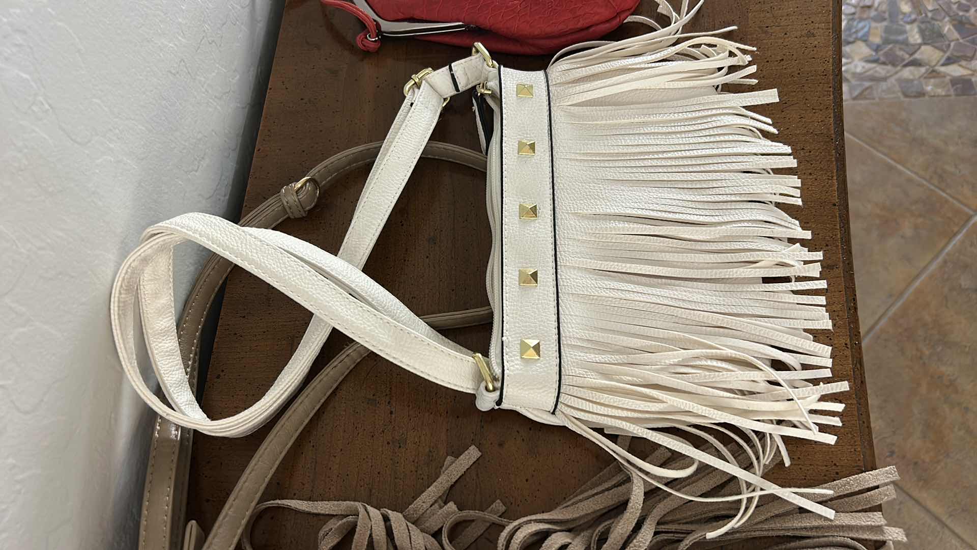 Photo 1 of THREE LADIES HANDBAGS W FRINGE