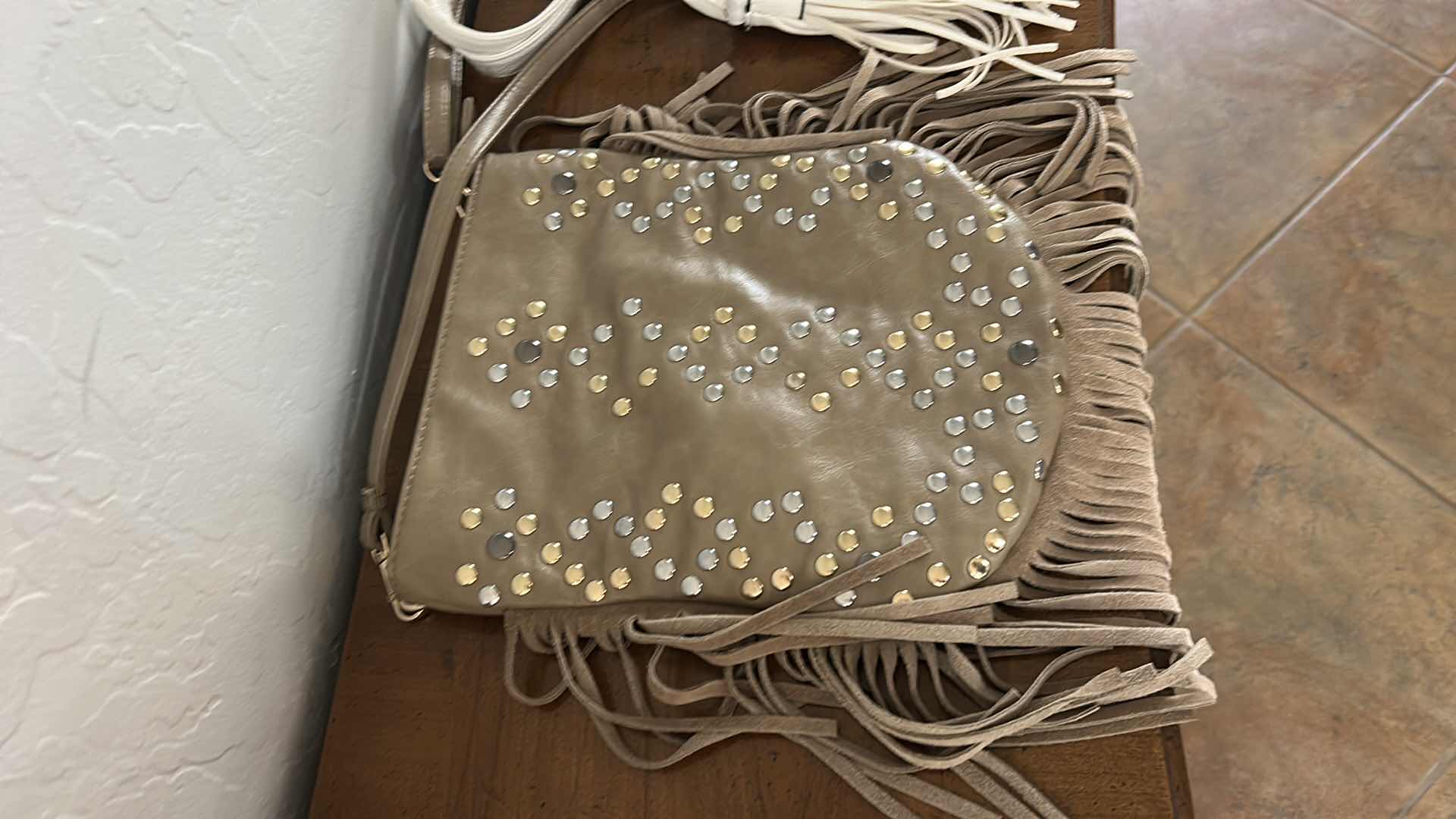 Photo 1 of THREE LADIES HANDBAGS W FRINGE