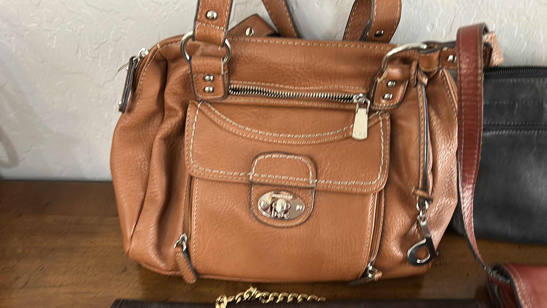 Photo 1 of FOUR LADIES HANDBAGS
