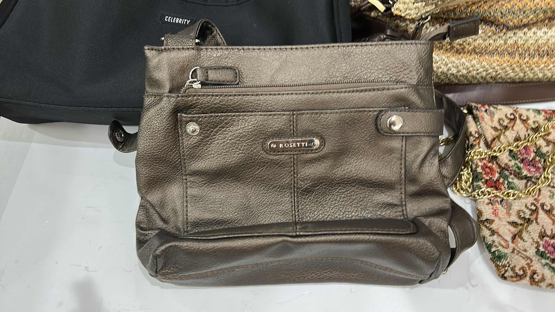 Photo 1 of SIX WOMEN’S HANDBAGS