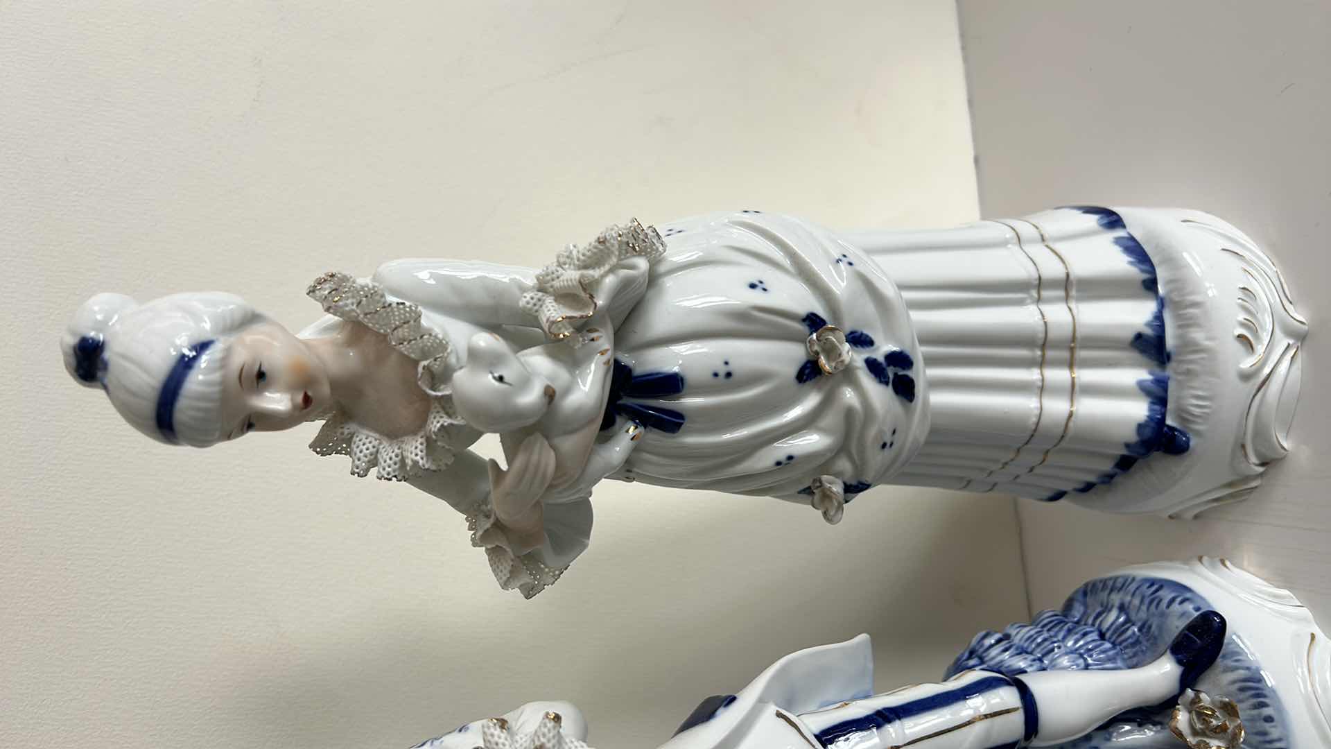 Photo 1 of 2 BLUE AND WHITE PORCELAIN FIGURINES H14.5”