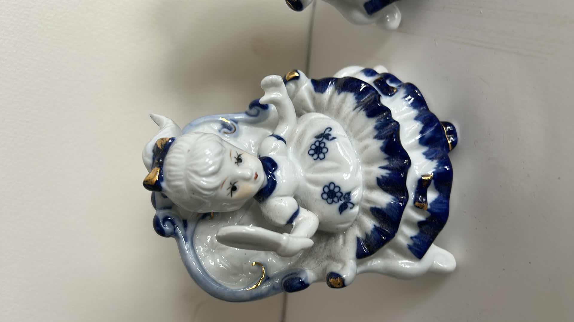 Photo 1 of 2 BLUE AND WHITE PORCELAIN FIGURINES H4.5”