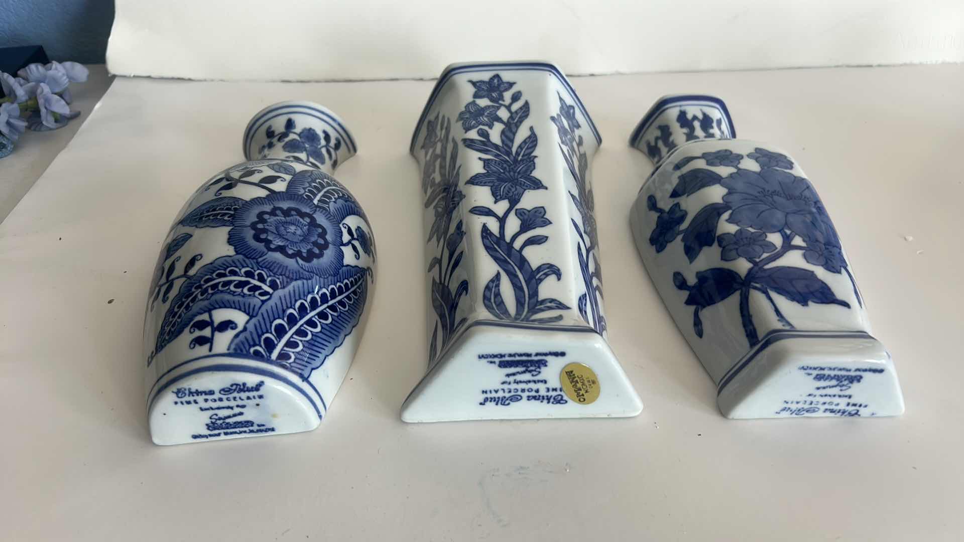 Photo 1 of 3 - FINE PORCELAIN BLUE AND WHITE WALL VASES H10”