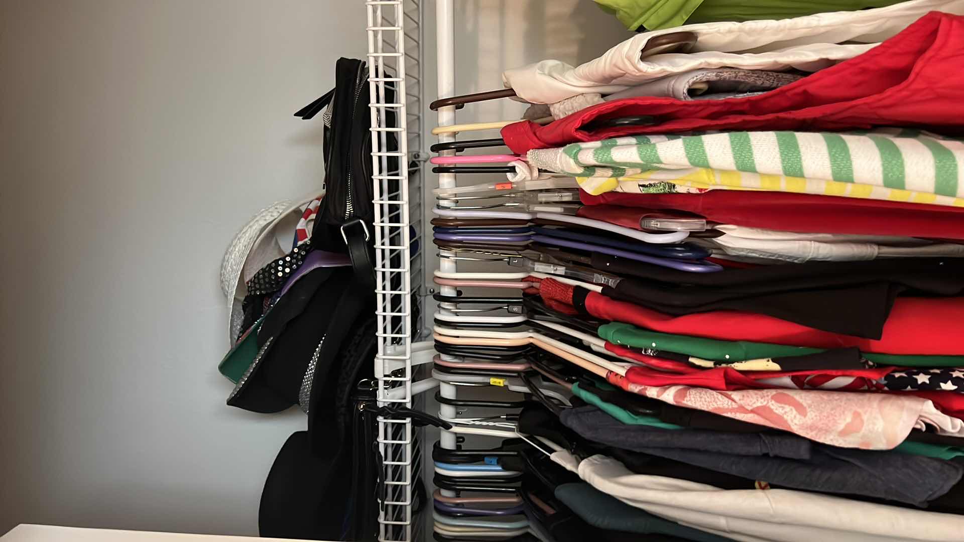 Photo 1 of CONTENTS OF BEDROOM CLOSET-LADIES CLOTHES, HATS, LINENS