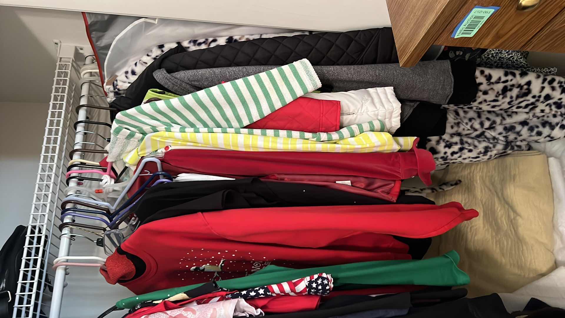 Photo 2 of CONTENTS OF BEDROOM CLOSET-LADIES CLOTHES, HATS, LINENS