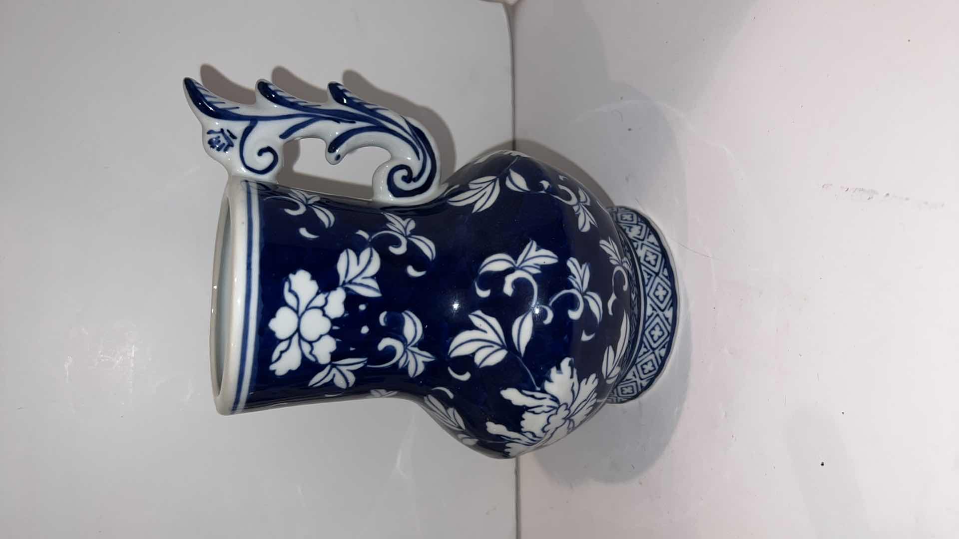 Photo 1 of 4-BLUE & WHITE CERAMIC PITCHERS (TALLEST HEIGHT 8”)