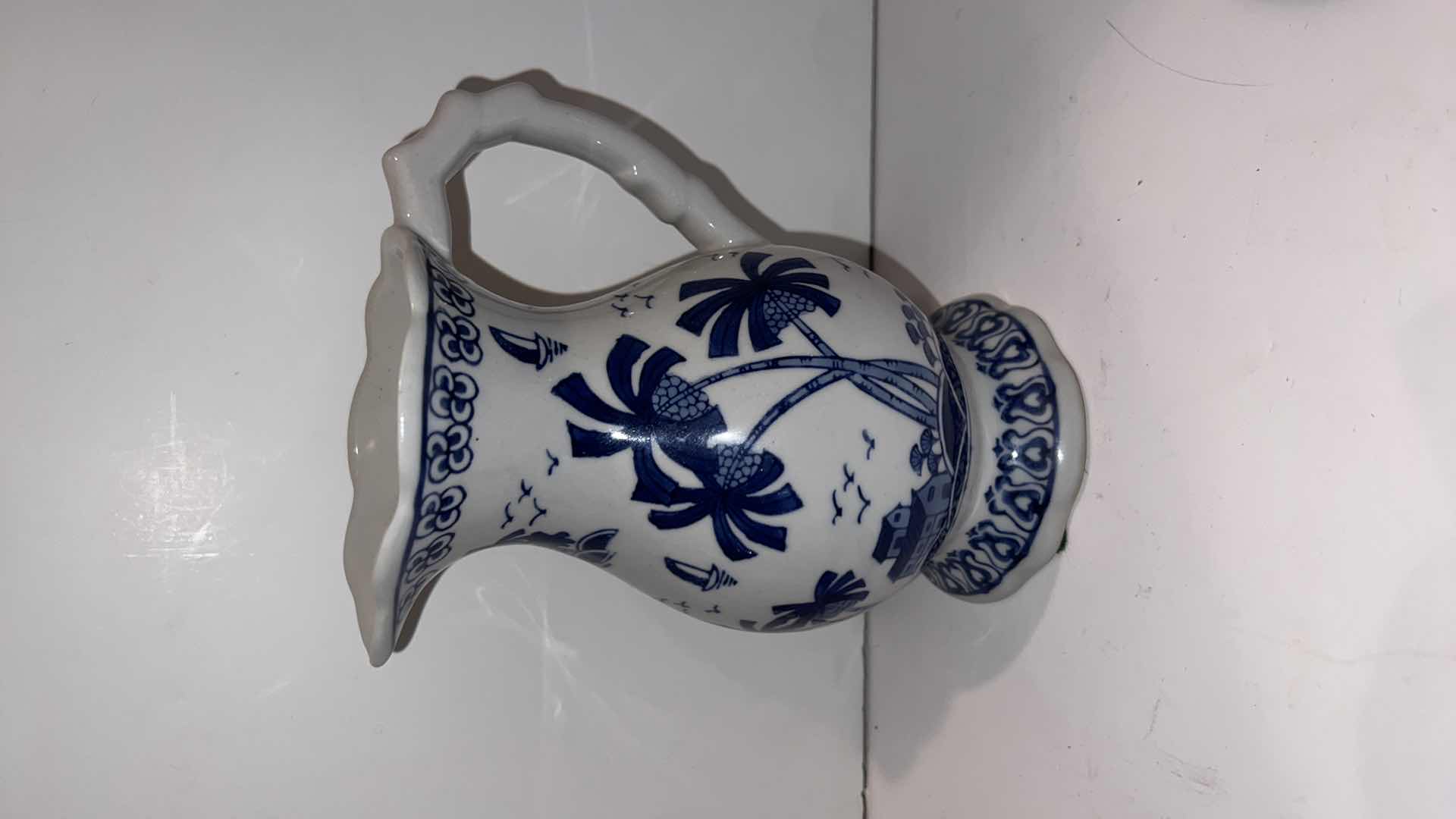 Photo 1 of 4-BLUE & WHITE CERAMIC PITCHERS (TALLEST HEIGHT 8”)