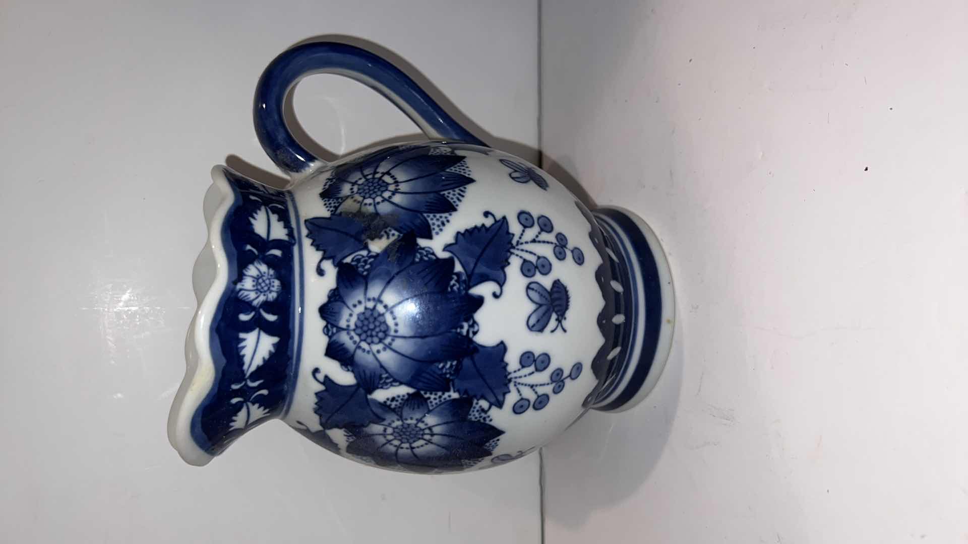 Photo 1 of 4-BLUE & WHITE CERAMIC PITCHERS (TALLEST HEIGHT 8”)