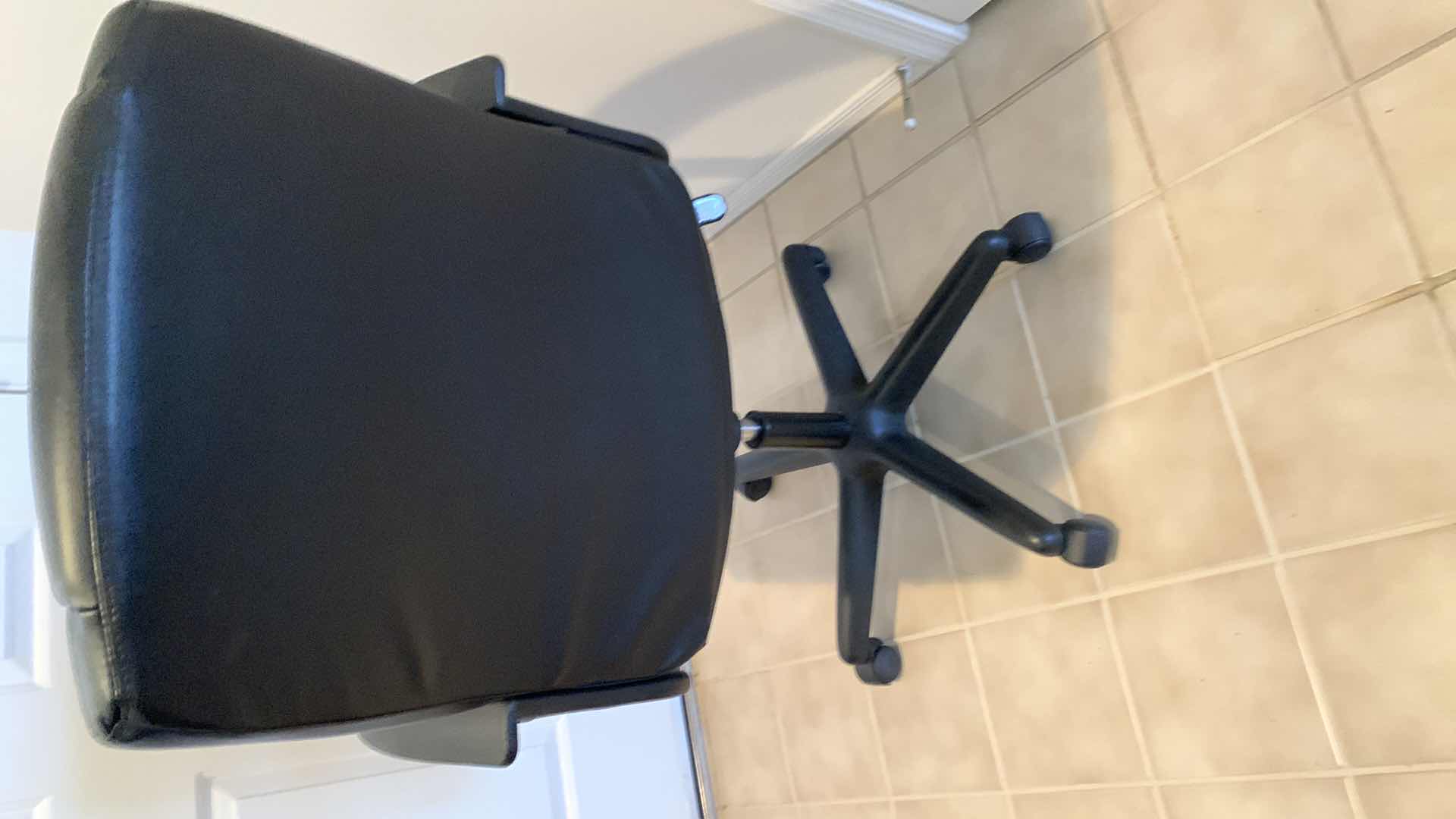 Photo 1 of BLACK SWIVEL OFFICE CHAIR