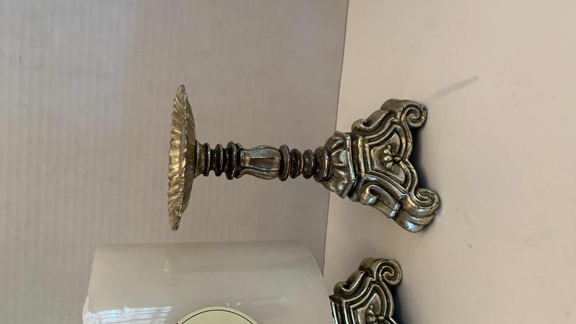 Photo 1 of YWO CANDLESTICKS AND A LARGE CANDLE