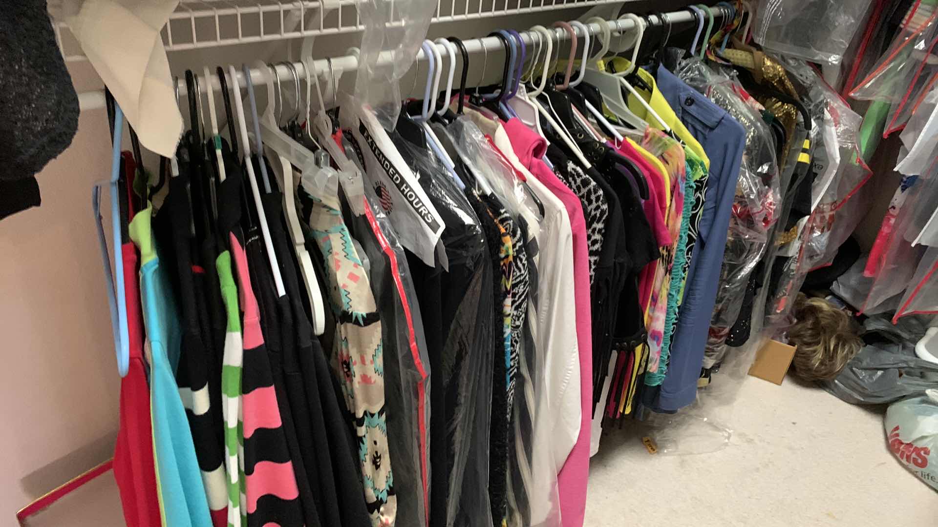 Photo 1 of CONTENTS OF CLOSET SIZE MEDIUM CLOTHING