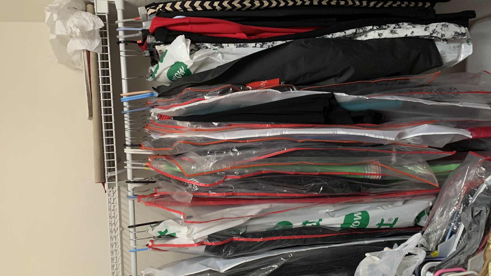 Photo 1 of CONTENTS OF CLOSET SIZE MEDIUM CLOTHING