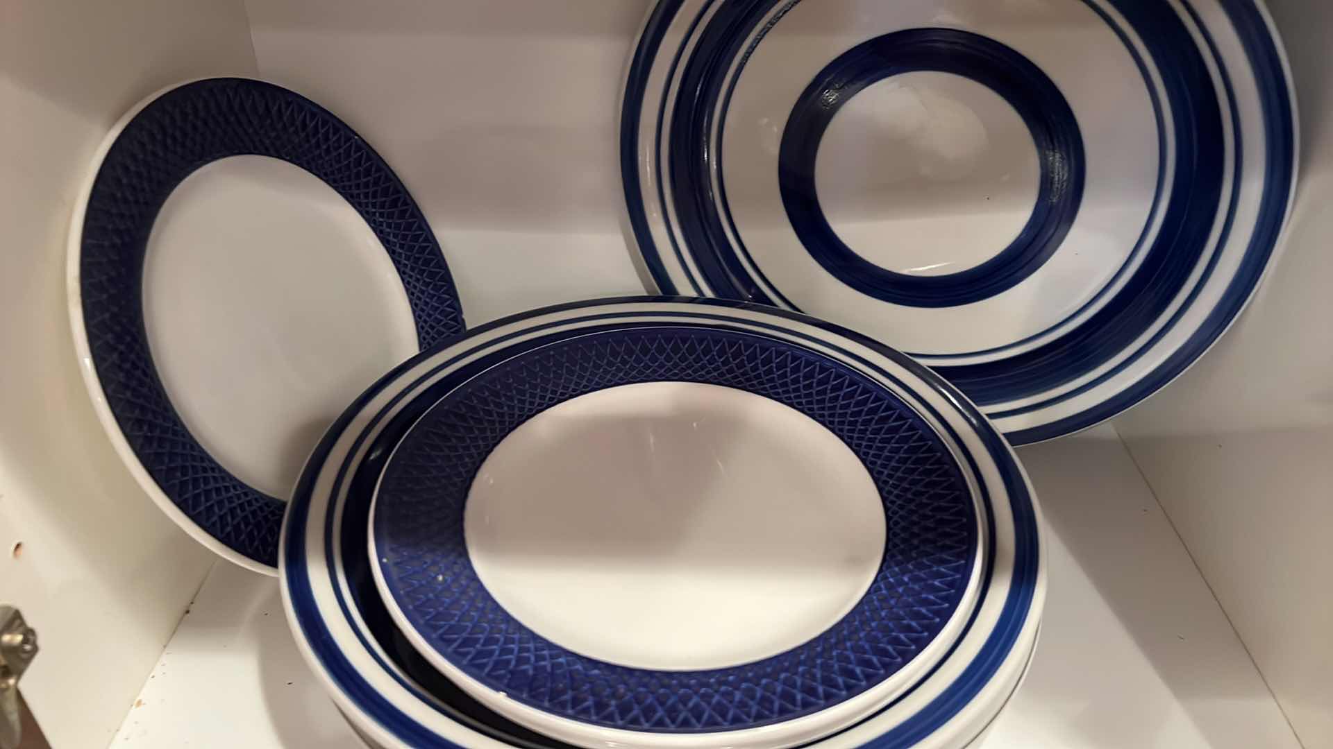 Photo 1 of CONTENTS OF KITCHEN CABINET-BLUE & WHITE CERAMIC DISHES