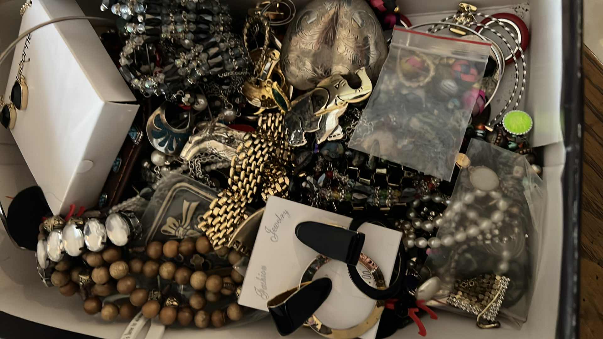 Photo 1 of BOX OF COSTUME JEWELRY