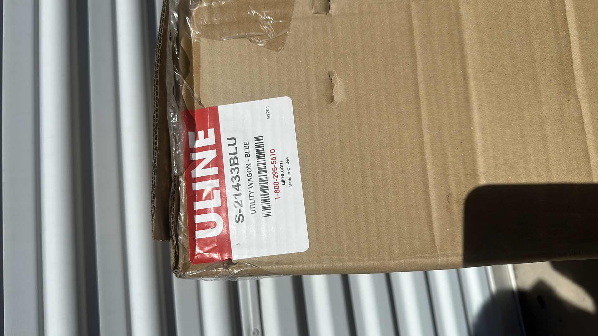 Photo 1 of NEW ULINE UTILITY WAGON BLUE COLOR