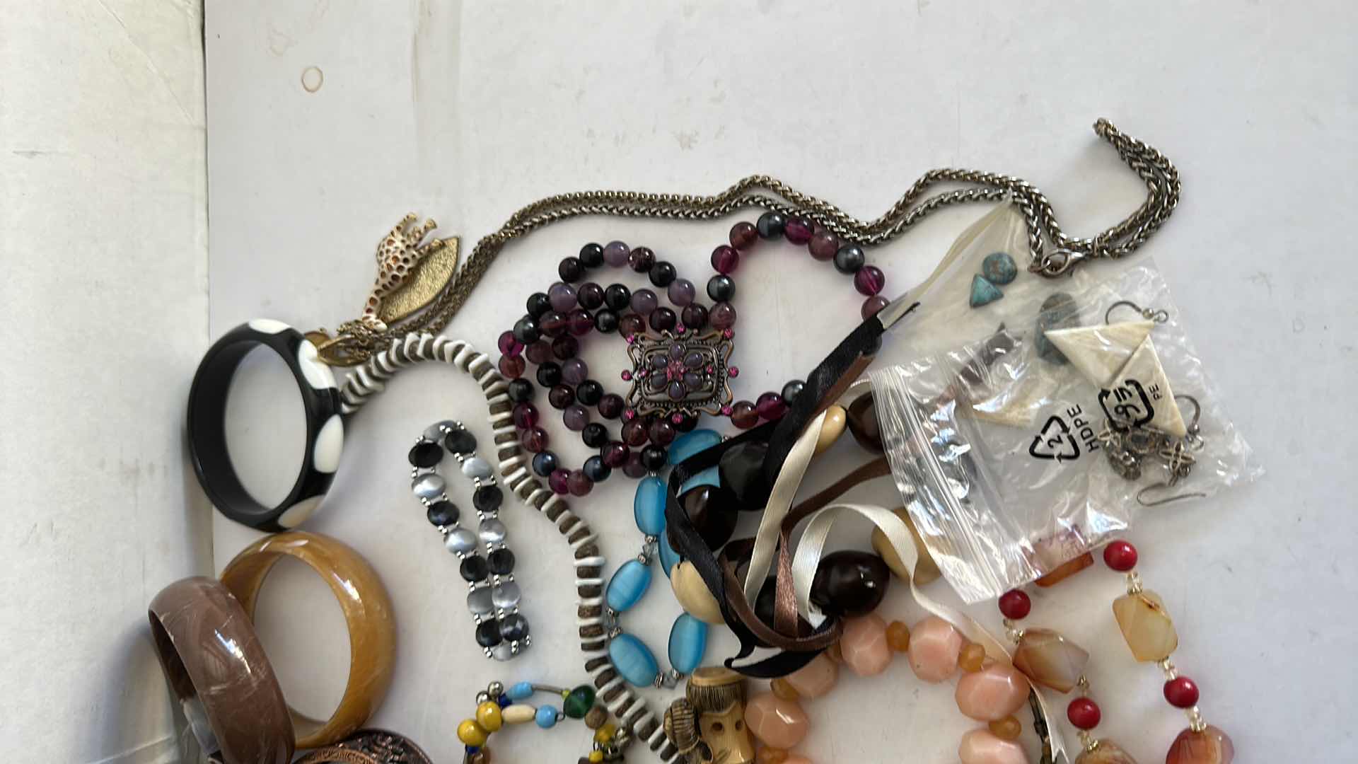 Photo 1 of BAG OF COSTUME JEWELRY