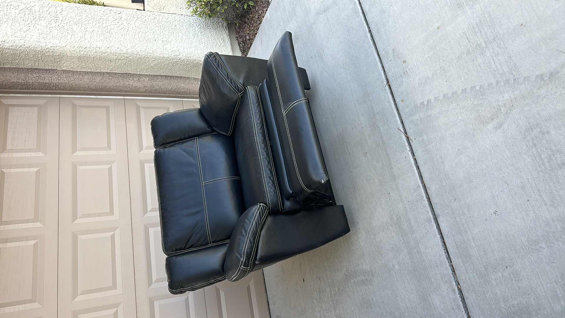 Photo 1 of OVERSIZED BLACK LEATHER RECLINER-GOOD CONDITION