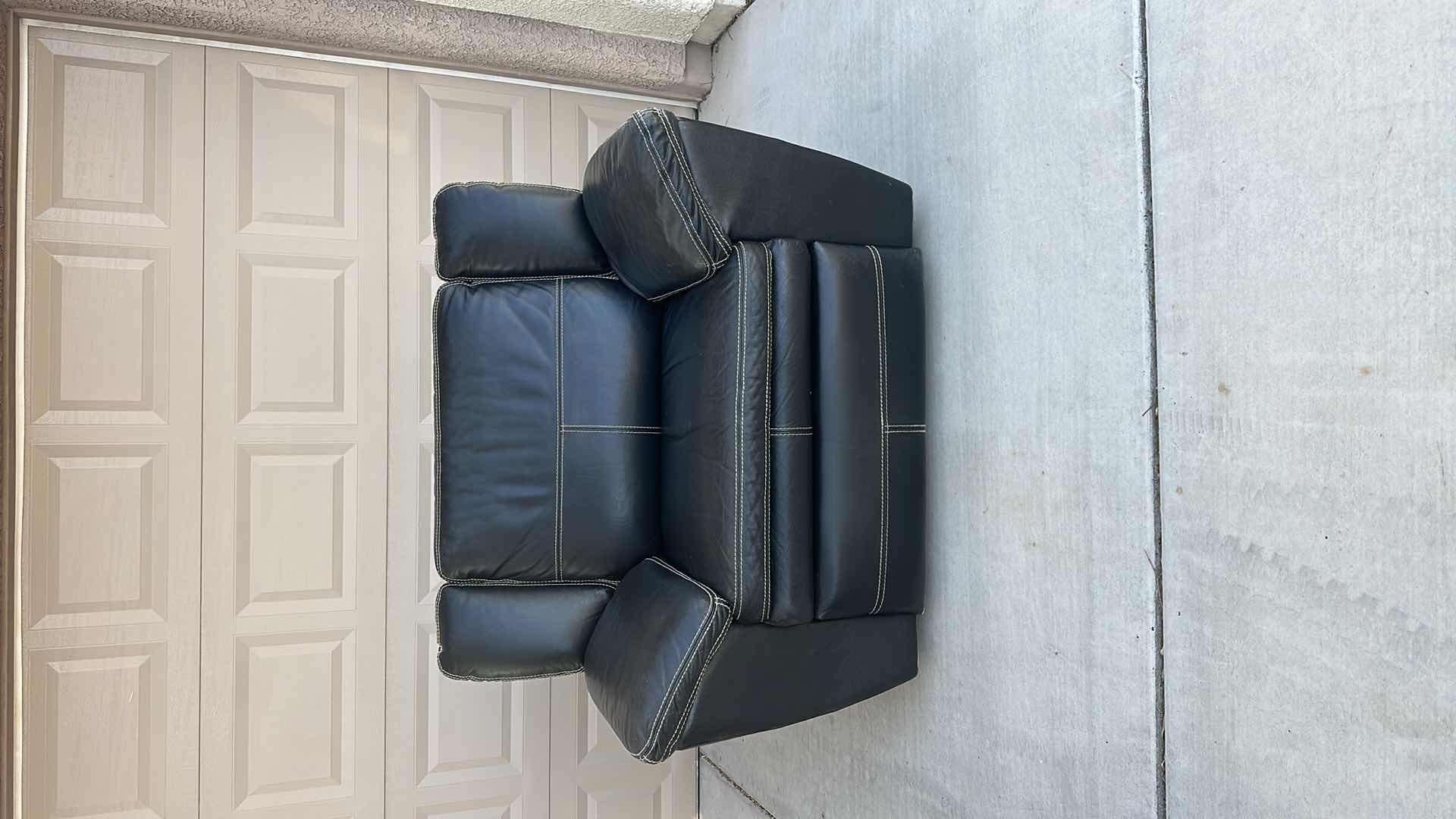 Photo 1 of OVERSIZED BLACK LEATHER RECLINER-GOOD CONDITION