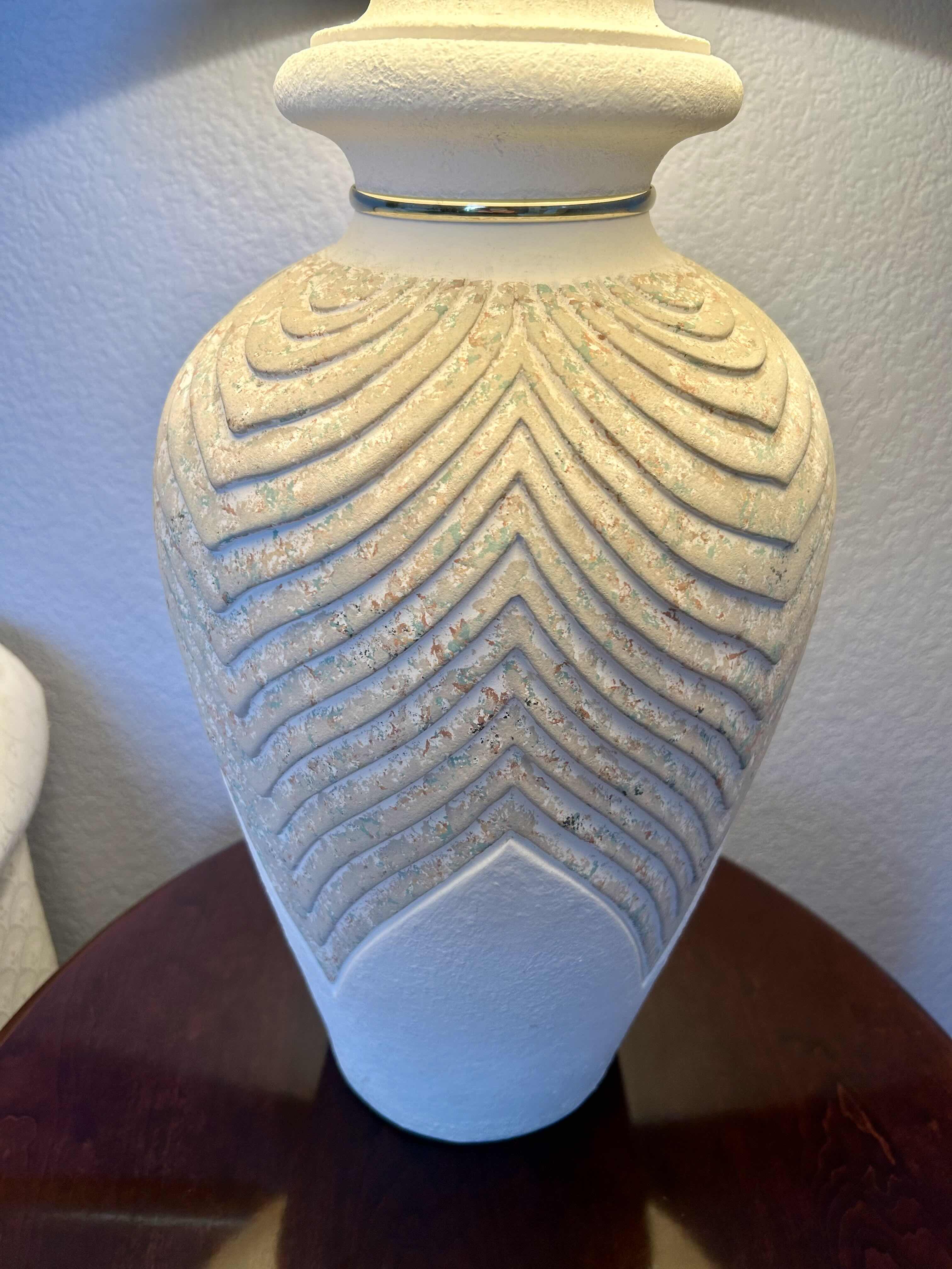 Photo 1 of CARVED CERAMIC  TABLE LAMP W SHADE  H33”