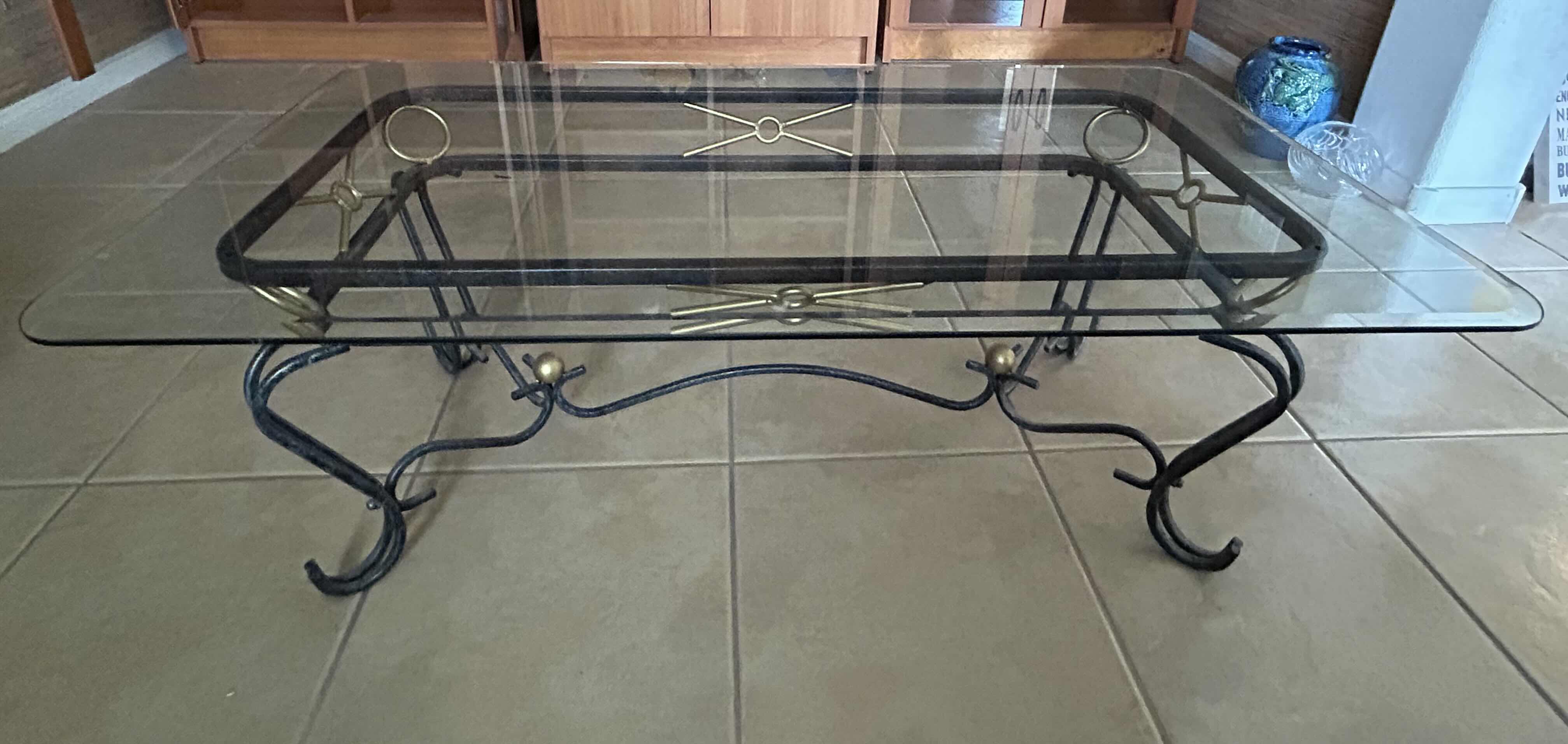 Photo 1 of COFFEE TABLE BLACK IRON W  GLASS TOP & GOLD ACCENTS 36" X 22" H17"