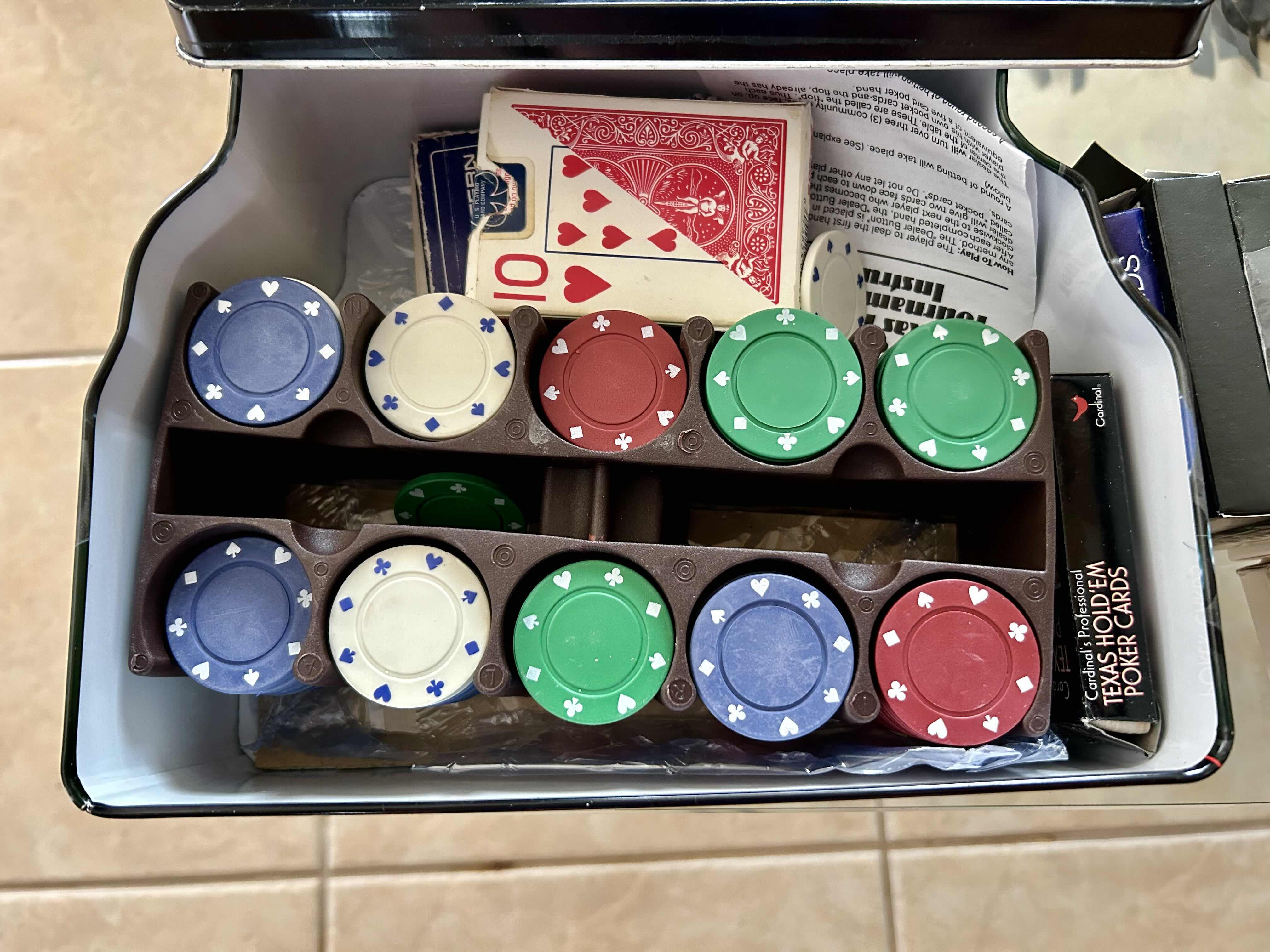 Photo 1 of COLLECTION OF POKER ITEMS: TEXAS HOLD’EM POKER SET WITH ADDITIONAL PLAYING CARDS AND BAG OF DICE