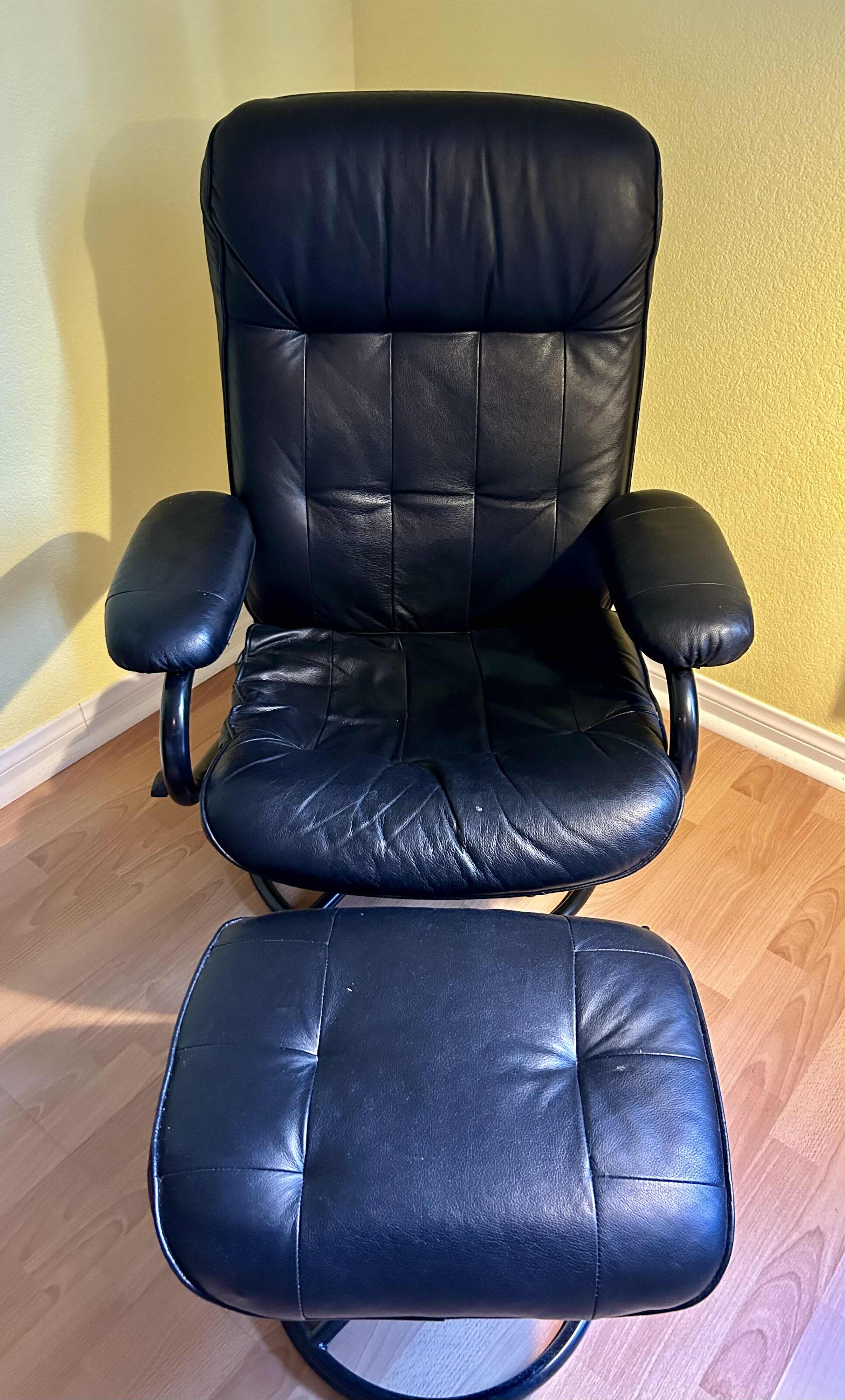 Photo 1 of BLACK LEATHER STRESSLESS STYLE RECLINING CHAIR WITH MATCHING OTTOMAN
