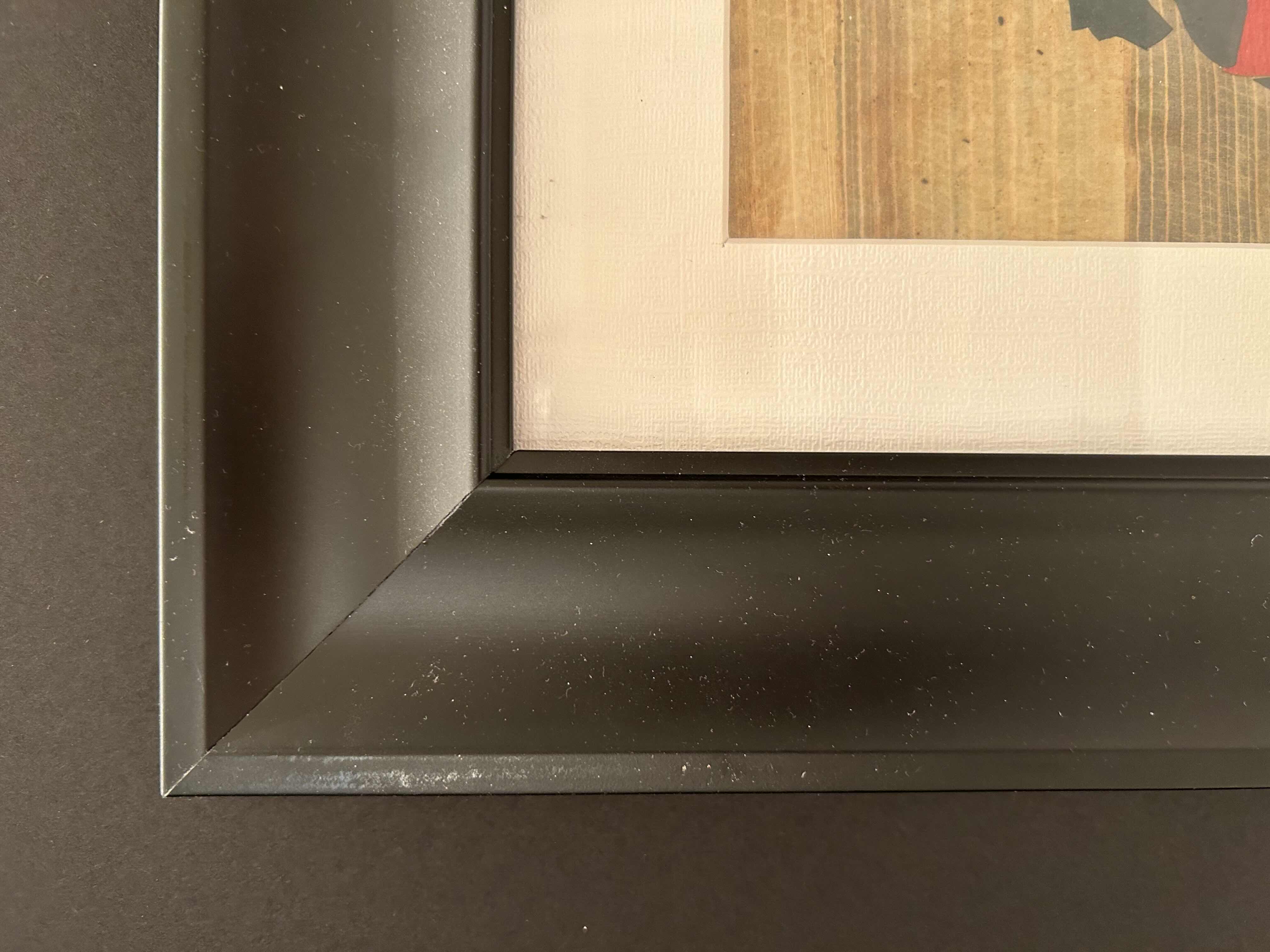 Photo 1 of DARK WOOD FRAMED WOVEN AFRICAN ARTWORK 12”X 14”

