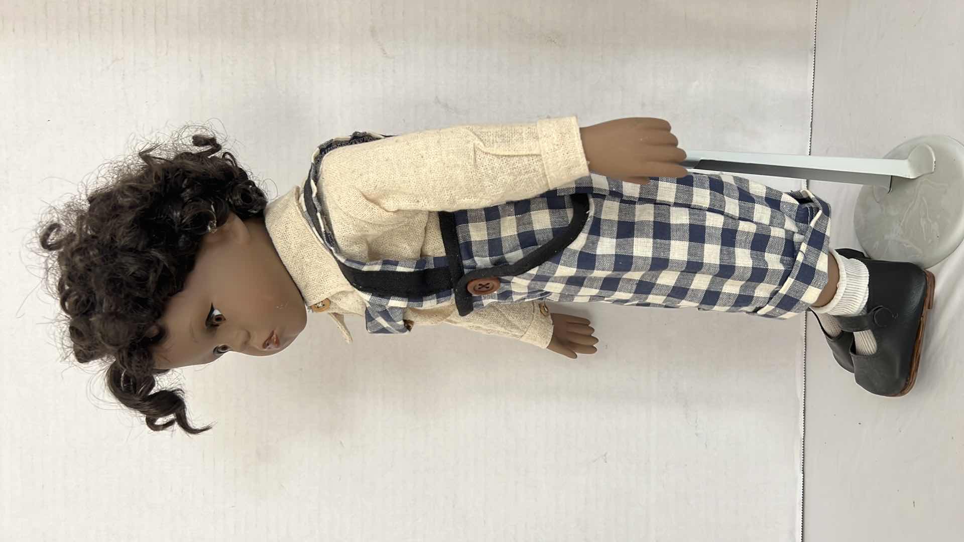 Photo 1 of AFRICAN AMERICAN PORCELAIN DOLL W STAND H20"