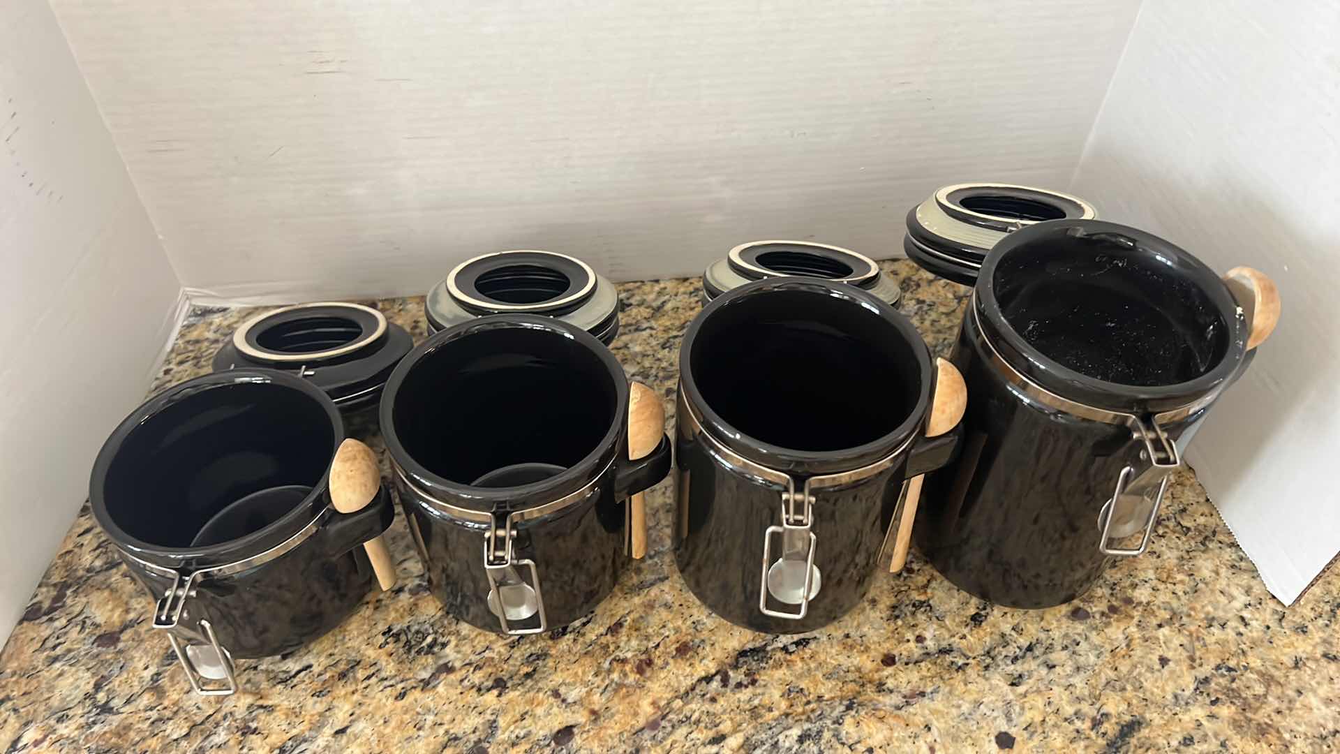 Photo 1 of 4-NAVY BLUE CERAMIC CANISTER SET W WOODEN SPOONS