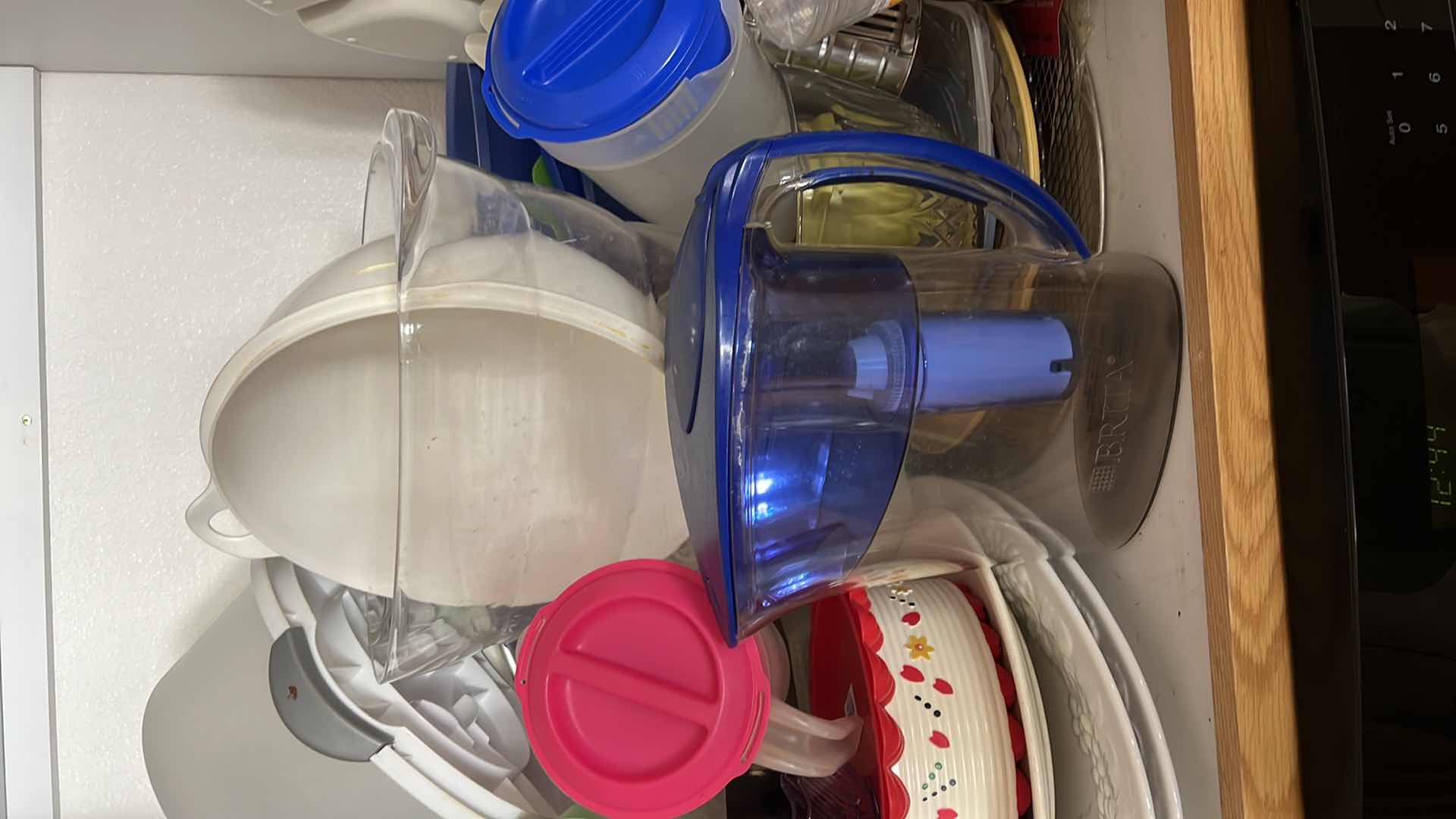 Photo 1 of CONTENTS OF KITCHEN CABINET-PLASTIC WAREV